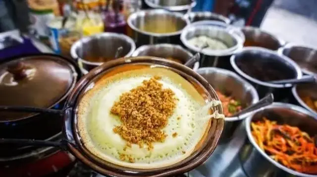 Close-up of Chengdu egg cake (danhonggao), a popular Chengdu street food with crispy outside and soft inside