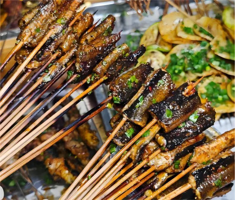 Chengdu Night Markets, close-up of sizzling BBQ skewers, showcasing vibrant street food and local flavors