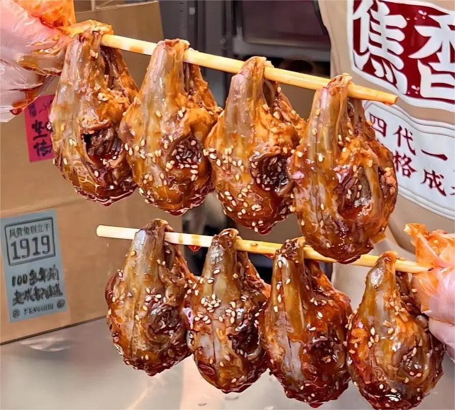 Chengdu Night Markets, close-up of spicy braised rabbit head, a famous local street food specialty