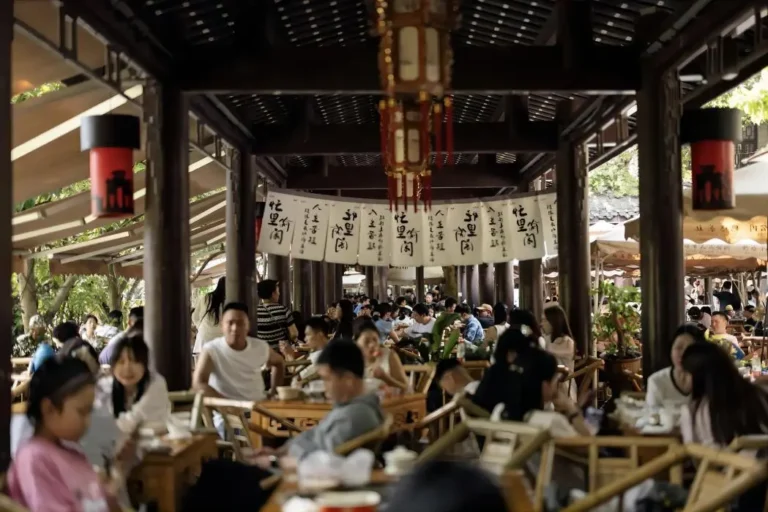 Visitors enjoying tea at Heming Tea House during a Chengdu 2-day itinerary