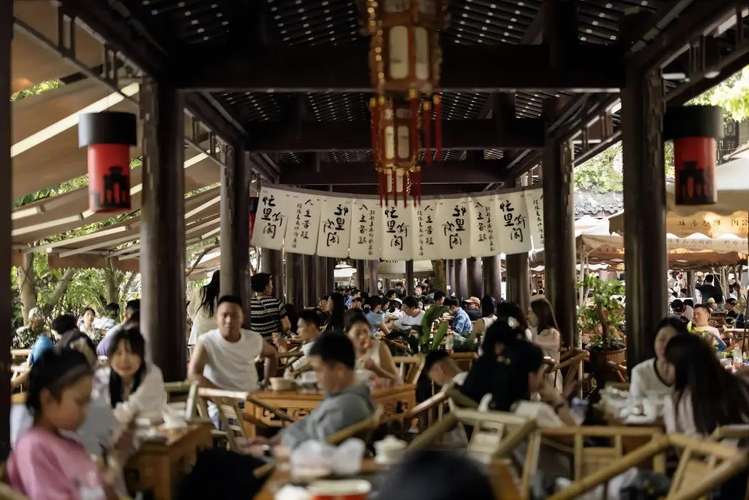 Visitors enjoying tea at Heming Tea House during a Chengdu 2-day itinerary