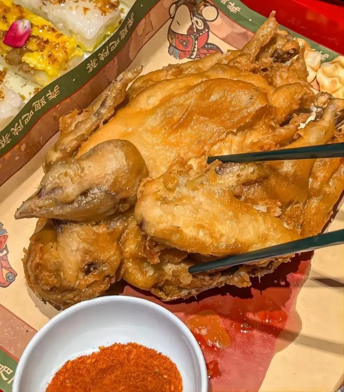 Hulu Chicken Xi’an street food on Local Food Trails, golden crispy fried chicken close-up