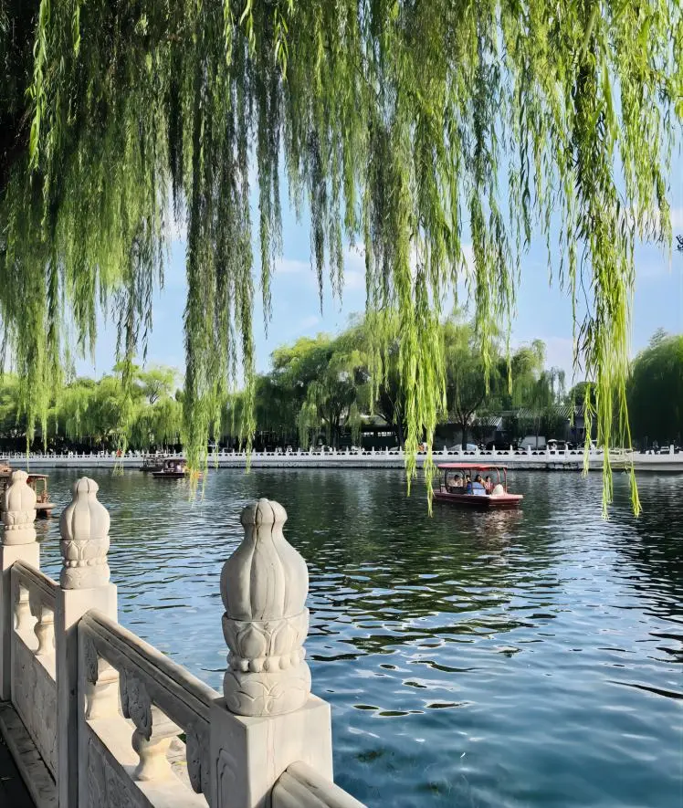 Houhai Lake at Shichahai, Beijing, reflecting historic hutongs