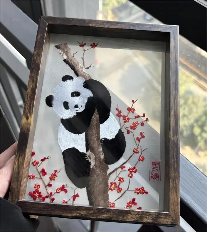 Shu Embroidery (Shuxiu) souvenir displayed at a street shop in Chengdu