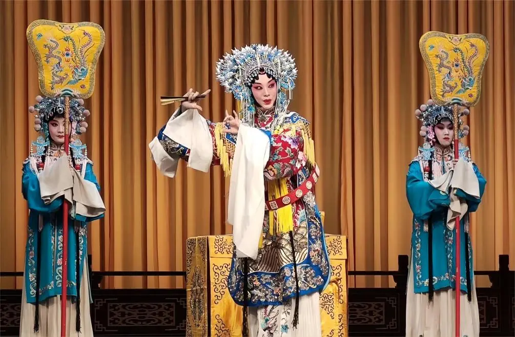 Peking Opera stage performance of “The Drunken Concubine,” featuring elegant movements and vibrant stage design.
