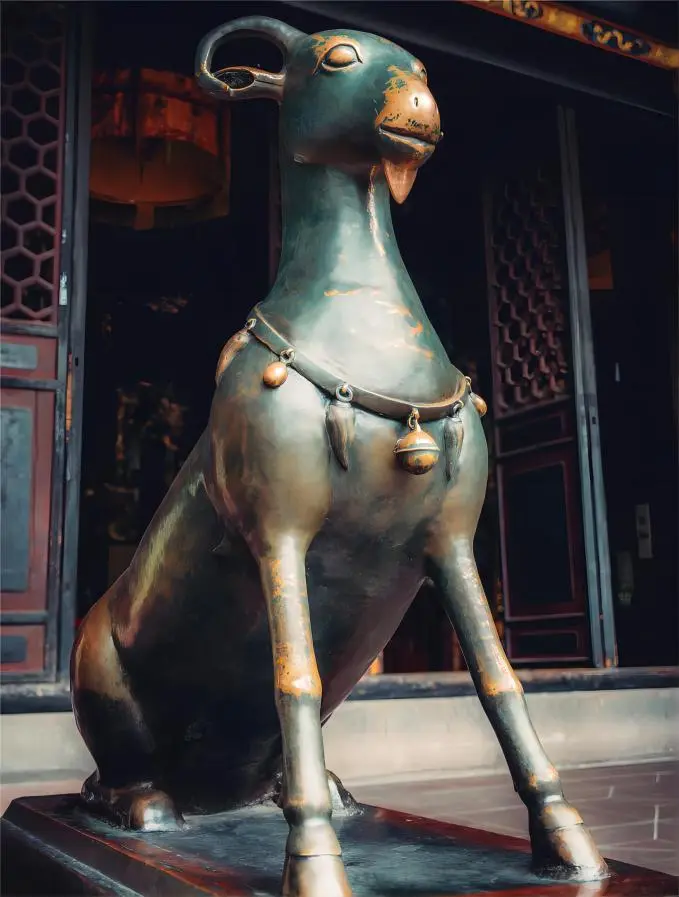 Double-horn Bronze Sheep sculpture at Qingyang Palace, a symbol of Yin-Yang harmony in Taoist belief