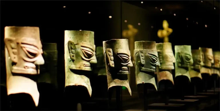Close-up of a row of bronze masks at Sanxingdui Museum, Chengdu