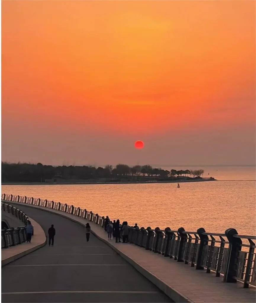 Sunset view over Dianshan Lake during a Shanghai day trip from Zhujiajiao Water Town