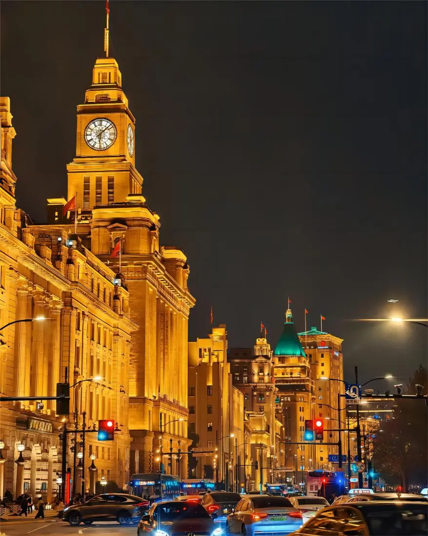 Night view of The Bund’s historic buildings illuminated along the Huangpu River in Shanghai
