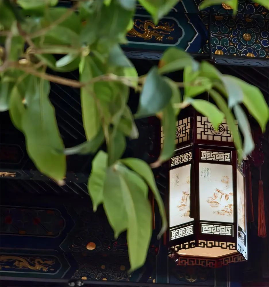 Red lantern hanging in Baiyun Temple, Beijing, reflecting the festive spirit of traditional Chinese Daoist temples.