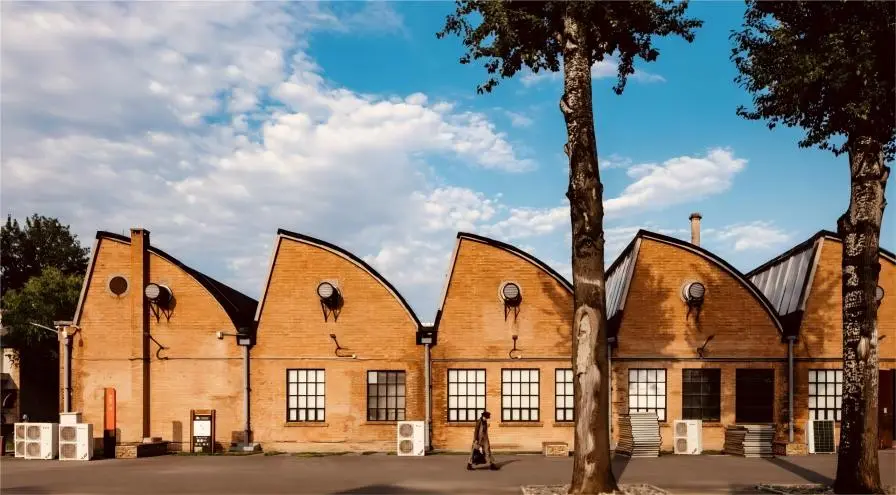 Unique and artistic building with creative architectural design in the Beijing 798 Art District street area.