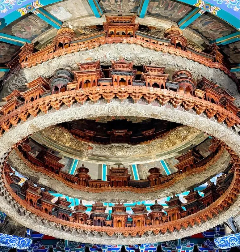 Panoramic view of the Longfusi Heavenly Palace Caisson at the Beijing Ancient Architecture Museum, showcasing its magnificent ancient wooden structure and ornate ceiling design.
