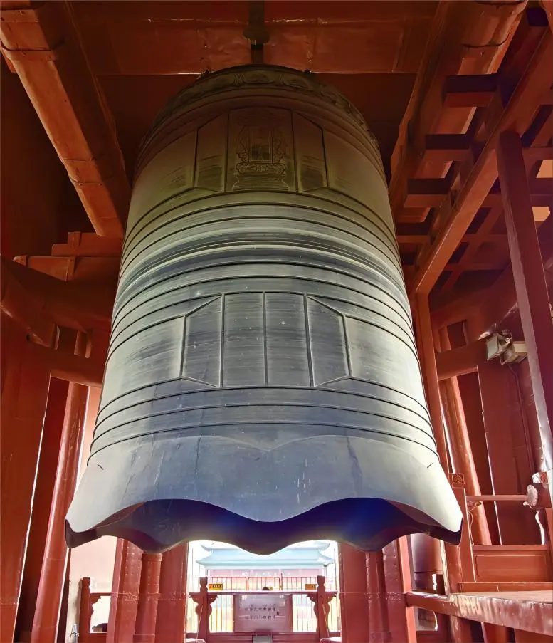 The giant ancient bell inside the Beijing Bell Tower, a key feature of the Zhonglou’s history.