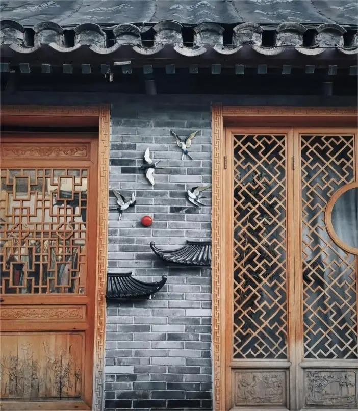 Close-up view of a textured wall in a Beijing hutongs, highlighting traditional materials and historic neighborhood details.