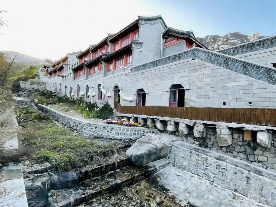 Beijing Longquan Temple nestled against the mountains, blending harmoniously with nature.