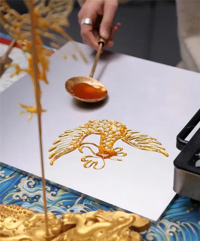 Phoenix figure created with Chengdu Sugar Painting (Tanghua)