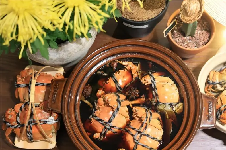 Crab dish served as part of Chongyang Festival food, highlighting regional culinary traditions in southern China.