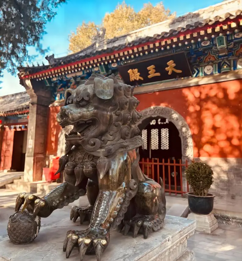 Hall of Heavenly Kings at Fayuan Temple, Beijing, featuring Ming Dynasty frescoes and statues
