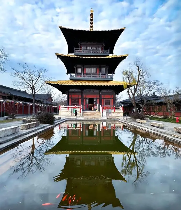 Fulin Pagoda at Guangfulin Shanghai on a sunny day, showcasing traditional wooden architecture.