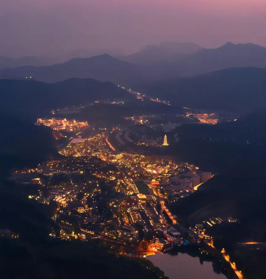 Nighttime aerial view of Gubei Water Town lights and canals