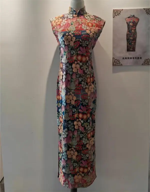 Close-up of embroidered Haipai Qipao in Shanghai exhibition, showing intricate handwork and Shanghai Style Cheongsam elegance