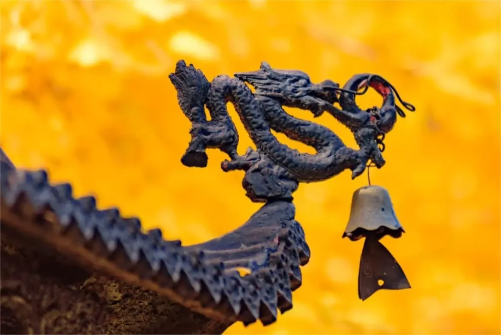 Architectural details of Hongluo Temple showing traditional Buddhist design and red walls