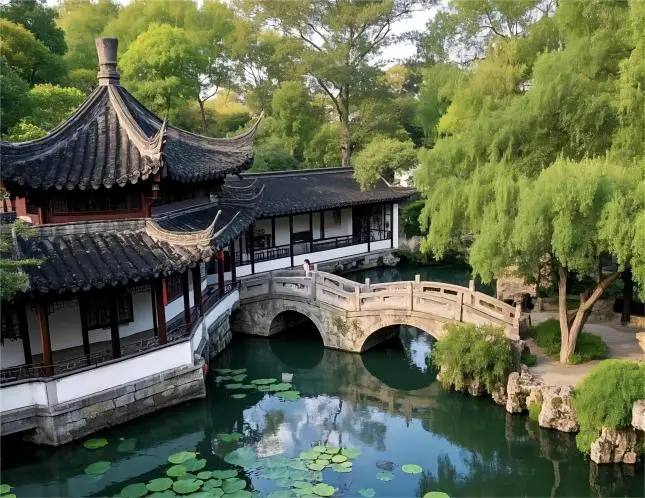 Summer scenery at the Humble Administrator’s Garden during a Suzhou Day Trip from Shanghai, featuring lotus ponds and lush greenery.