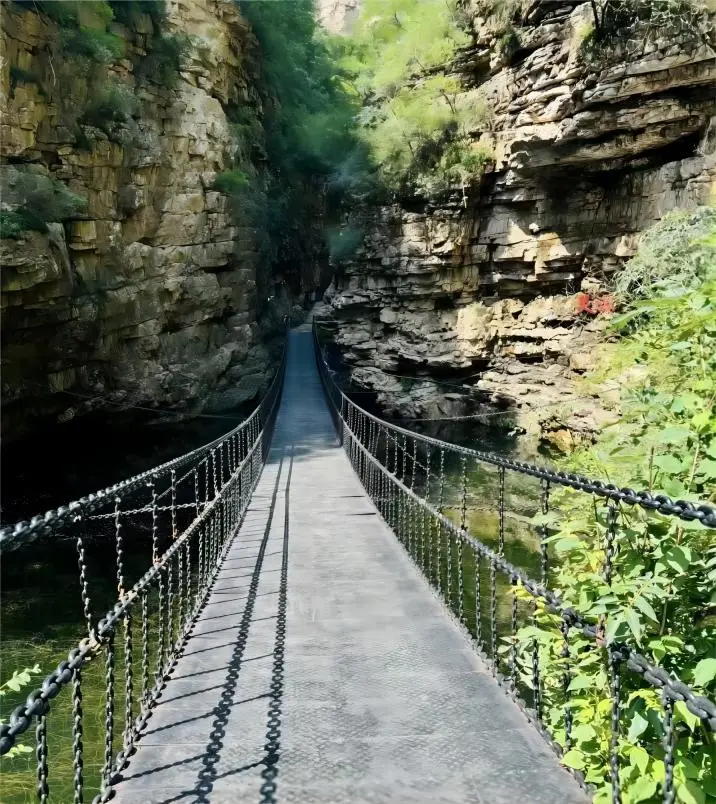 Suspension bridge over a deep gorge at Jingdong Grand Canyon in Beijing
