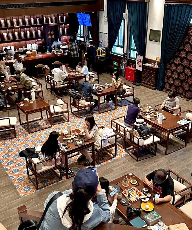 Interior of Laijinyuxuan Teahouse in Beijing Zhongshan Park, known for its traditional tea and winter vegetable buns.