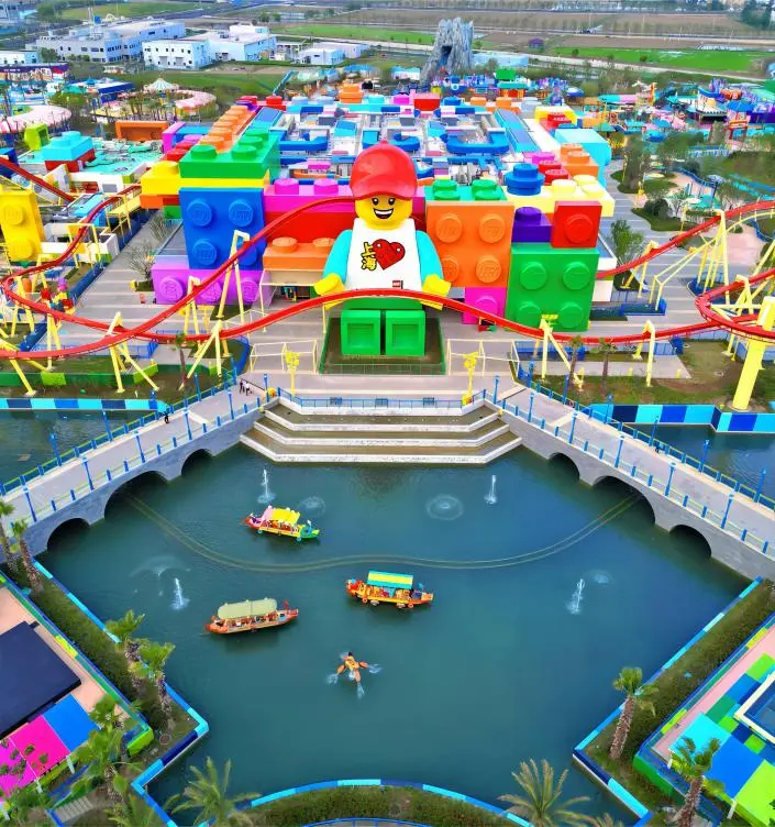 Aerial view of LEGO Creative World at Shanghai LEGOLAND Resort, featuring large-scale LEGO structures and themed attractions.