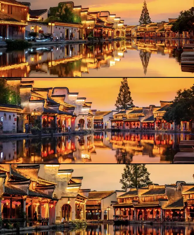 Night view of Nanxun Water Town from Shanghai, with illuminated canals and historic buildings reflecting on the water.