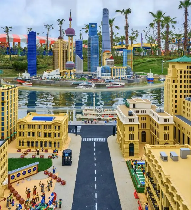 Scenic view of Shanghai LEGOLAND Resort showing colorful LEGO structures and family attractions in the park.