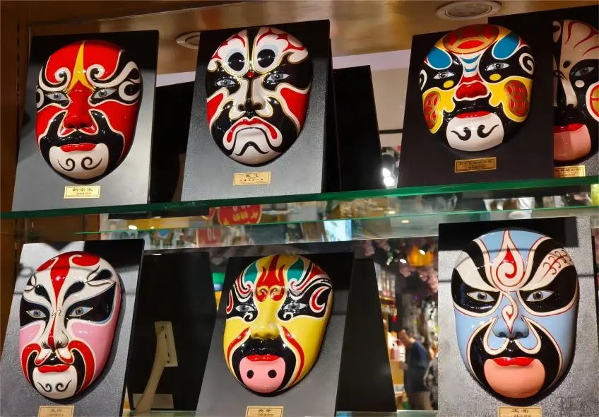 Traditional Sichuan Opera face painting mask showing symbolic colors of face changing art