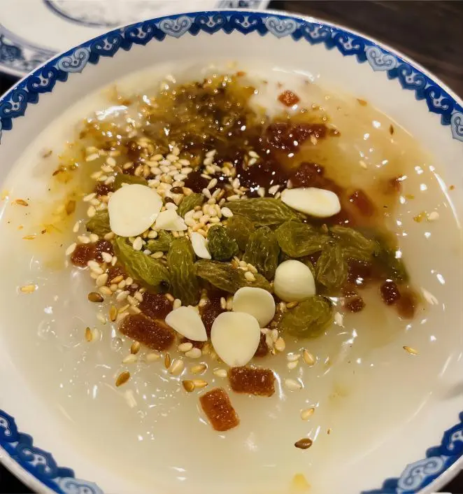 Close-up of Xingren Cha (almond tea), a smooth and warming Beijing traditional beverage.