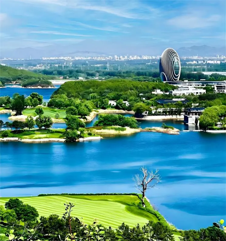 Sunny summer day at Yanqi Lake in Beijing, with clear blue skies and sparkling waters under warm sunlight.