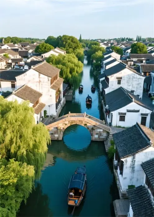 Aerial view of Zhouzhuang water town, showing canals, bridges, and traditional houses