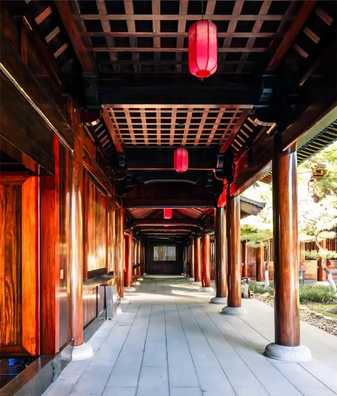 Timber corridor at Baoshan Temple Shanghai with traditional columns and quiet Zen atmosphere