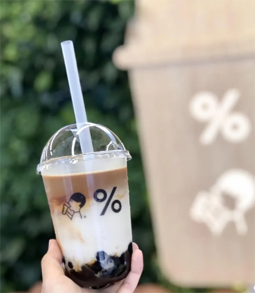 Close-up of HEYTEA milk tea highlighting its smooth texture and signature tea aroma.