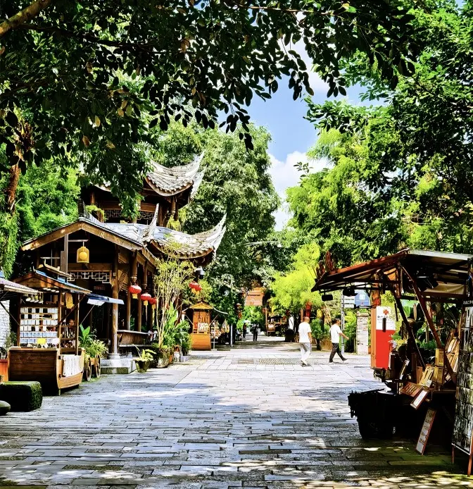 Quiet morning scene in Huanglongxi Ancient Town, with stone streets and riverside life slowly waking up