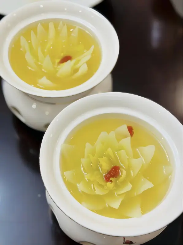 Close-up of Kai Shui Bai Cai, also known as Steamed Cabbage in Supreme Soup, a famous Chengdu local dish