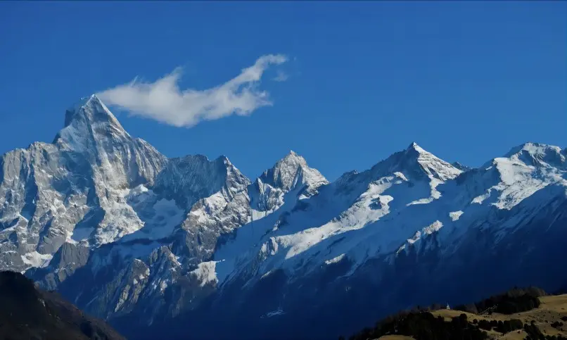 Panoramic view of Mount Siguniang’s four peaks from Maoboliang Viewpoint at sunset
