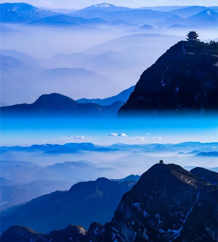 Panoramic mountain landscape of Mount Emei with lush forests and mist