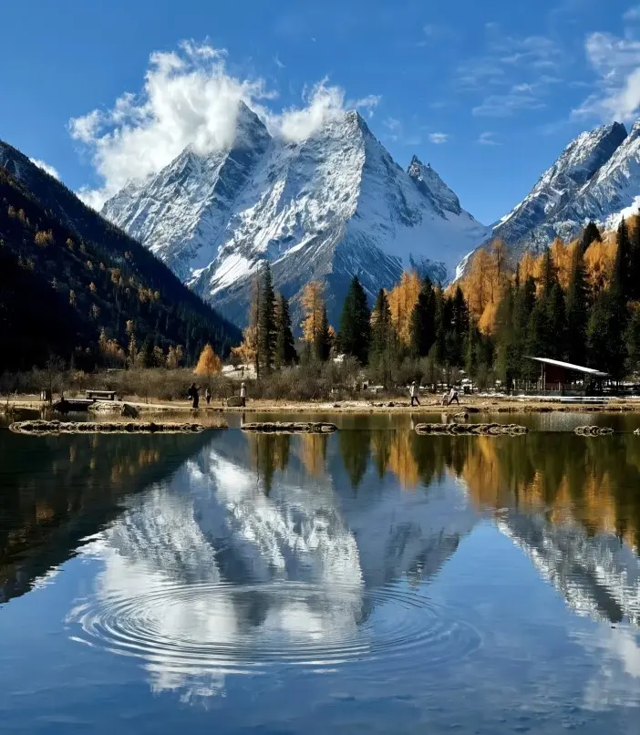 Glacier and meadow scenery in Shuangqiao Valley at Mount Siguniang Scenic Area