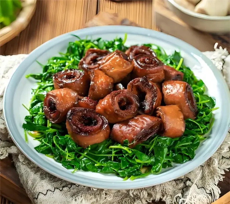traditional Shanghai Caotou Quanzi with tender intestines and vibrant green alfalfa