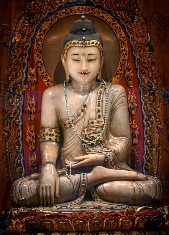 Sitting Jade Buddha statue at Jade Buddha Temple in Shanghai, a central attraction of the Buddhist temple