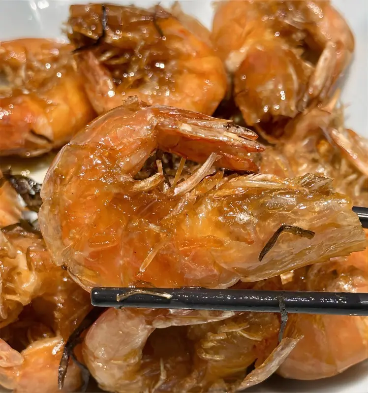 Close-up of Shanghai Youbao Xia showing crispy shell and tender shrimp