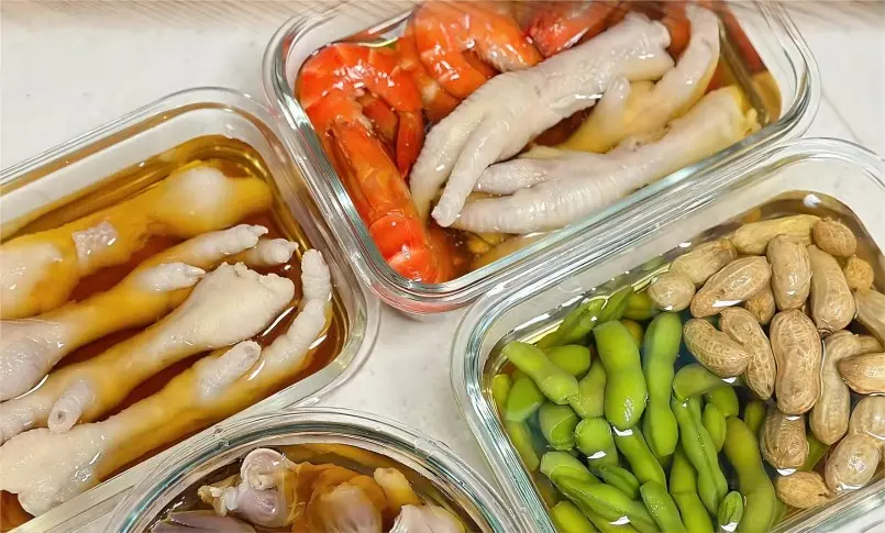 Traditional Shanghai Zao Huo selection with assorted drunken delicacies such as shrimp, chicken wings, abalone, peanuts, edamame, and gizzard.