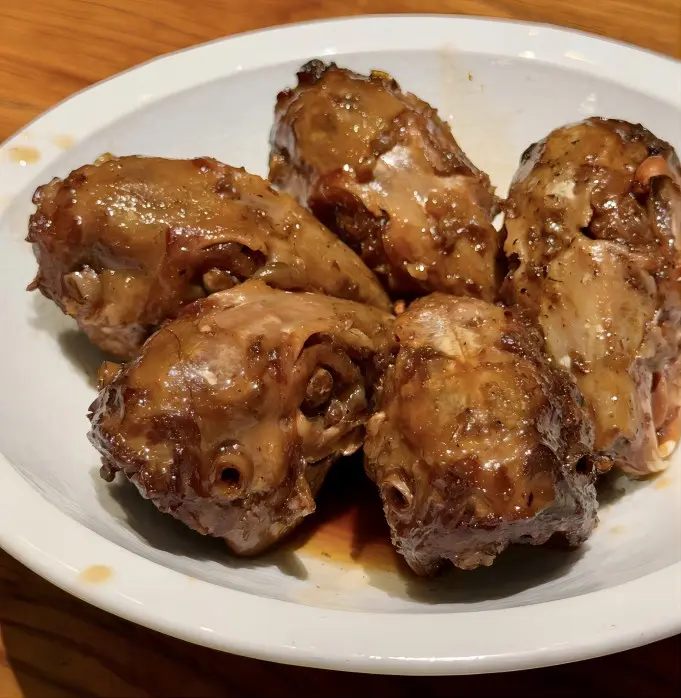 Laoma Rabbit Head with savory sauce, traditional Chengdu street snack