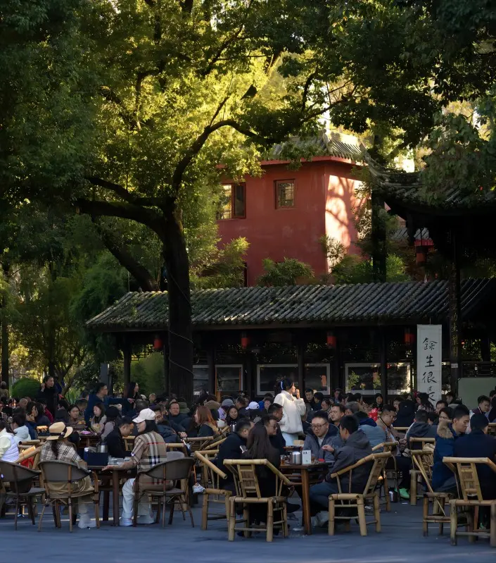 Enjoying traditional Baba tea at Tiexiang Temple Water Street in Chengdu