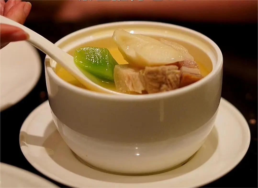 Traditional Yan Du Xian from Shanghai Benbang cuisine featuring tender pork and spring bamboo shoots.